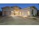 Home with a large driveway and two-car garage, showing its inviting exterior at 330 W Locust Dr, Chandler, AZ 85248