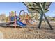 Community playground featuring colorful play equipment and a shaded canopy for year-round enjoyment at 330 W Locust Dr, Chandler, AZ 85248