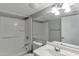 Bathroom features a shower-tub combo, toilet, sink and large mirror at 3500 N Hayden Rd # 2109, Scottsdale, AZ 85251