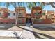 Contemporary apartment building with neutral colors, balconies, and well-maintained landscaping creates an inviting curb appeal at 3500 N Hayden Rd # 2109, Scottsdale, AZ 85251