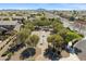 Aerial view of community basketball court surrounded by mature shade trees and walking paths at 3551 E Shannon St, Gilbert, AZ 85295