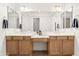 This bathroom features and sinks, plenty of counter space, and large mirrors at 3551 E Shannon St, Gilbert, AZ 85295