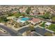 Aerial shot highlights the community pool, ramada, parking area and surrounding neighborhood at 3551 E Shannon St, Gilbert, AZ 85295