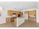 Bright kitchen featuring a breakfast bar, stainless steel appliances, and lots of cabinet space at 3551 E Shannon St, Gilbert, AZ 85295