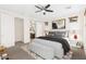 This main bedroom features neutral walls, carpet, and access to an ensuite bathroom at 3551 E Shannon St, Gilbert, AZ 85295