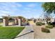 Community playground featuring play structures, a covered picnic area, and well-maintained landscaping at 3551 E Shannon St, Gilbert, AZ 85295