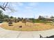 A view of playground featuring various play structures, a covered picnic area and benches at 3551 E Shannon St, Gilbert, AZ 85295