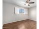 Bedroom featuring wood-look floors, and a ceiling fan at 3614 W Georgia Ave, Phoenix, AZ 85019