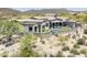 Expansive aerial view of the estate showcasing the pool, landscaping, and surrounding desert landscape at 37975 N 98Th Pl, Scottsdale, AZ 85262