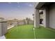 Backyard putting green with desert views provides fun for golfers at 37975 N 98Th Pl, Scottsdale, AZ 85262