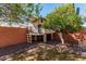 Unique backyard treehouse on stilts surrounded by landscaping and trees at 3927 W Phelps Rd, Phoenix, AZ 85053