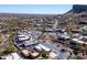 Stunning aerial view of a desert community with mountain views and winding roads at 4309 S Priceless View Dr, Gold Canyon, AZ 85118