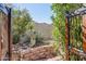 Beautiful desert landscaping and retaining wall at 4309 S Priceless View Dr, Gold Canyon, AZ 85118