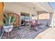 Inviting outdoor patio with brick flooring and a sliding glass door entrance at 4309 S Priceless View Dr, Gold Canyon, AZ 85118