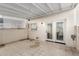 Covered patio featuring tiled flooring and access via double doors at 4341 W Ocotillo Rd, Glendale, AZ 85301