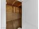 Interior of a small storage area with wood and hanging screens at 4341 W Ocotillo Rd, Glendale, AZ 85301