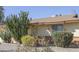 Exterior shot of a home with desert plants enhancing the property's curb appeal at 4428 W Mission Ln, Glendale, AZ 85302