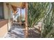 View of home's exterior showing an outdoor area with desert landscaping, plants, and a covered entry at 4428 W Mission Ln, Glendale, AZ 85302