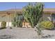 Manicured front yard showcasing desert flora in a xeriscaped garden at 4428 W Mission Ln, Glendale, AZ 85302