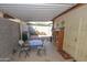 Covered patio with furniture, providing space for outdoor relaxation and entertaining at 4428 W Mission Ln, Glendale, AZ 85302