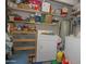 Storage room with shelving and laundry appliances at 4428 W Mission Ln, Glendale, AZ 85302