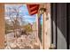 Cozy balcony features outdoor seating with view of neighborhood and the Arizona sky at 455 S Delaware Dr # 106, Apache Junction, AZ 85120