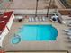 Inviting community pool and hot tub with ample seating for residents at 455 S Delaware Dr # 106, Apache Junction, AZ 85120