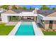 Stunning aerial view of a modern home with a sparkling pool and well-manicured backyard at 4704 N 40Th Pl, Phoenix, AZ 85018