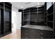 Well-organized walk-in closet with gray wood cabinetry and plenty of drawer space at 4704 N 40Th Pl, Phoenix, AZ 85018