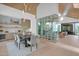 View of the dining room with modern lighting, built-in cabinetry and a wine cellar at 4704 N 40Th Pl, Phoenix, AZ 85018