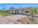 Stunning single-story home featuring a unique design, stone accents, and a spacious driveway with desert landscaping at 4704 N 40Th Pl, Phoenix, AZ 85018