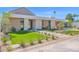 Beautiful front exterior with vibrant green lawn, desert landscaping, and a modern design with a carport at 4704 N 40Th Pl, Phoenix, AZ 85018