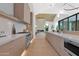 Open-concept kitchen with Wolf range, a long island counter, and lots of space at 4704 N 40Th Pl, Phoenix, AZ 85018