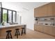 Modern kitchen with sleek cabinets, bar seating, and stylish decor at 4704 N 40Th Pl, Phoenix, AZ 85018