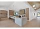 Modern kitchen with expansive island, seating, and sleek finishes at 4704 N 40Th Pl, Phoenix, AZ 85018