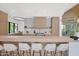 Modern kitchen features a breakfast bar with comfortable seating and abundant natural light at 4704 N 40Th Pl, Phoenix, AZ 85018