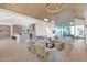 Spacious living room with a clear view to the kitchen and featuring light wood floors at 4704 N 40Th Pl, Phoenix, AZ 85018