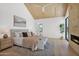 Spacious main bedroom features vaulted ceilings, a stone fireplace, and hardwood flooring at 4704 N 40Th Pl, Phoenix, AZ 85018