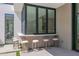 A covered outdoor bar area offering seamless indoor-outdoor living with stylish barstools at 4704 N 40Th Pl, Phoenix, AZ 85018