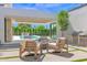 Stylish outdoor patio with comfortable seating, a built-in grill, and views of the pool at 4704 N 40Th Pl, Phoenix, AZ 85018