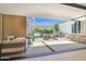 Inviting outdoor patio with comfortable seating, built-in grill, and access to the sparkling pool at 4704 N 40Th Pl, Phoenix, AZ 85018