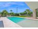 Inviting pool area featuring a shallow end and lush landscaping, creating a serene outdoor space at 4704 N 40Th Pl, Phoenix, AZ 85018