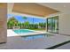 Stunning swimming pool with sleek, modern design and lush landscaping, ideal for relaxation and entertainment at 4704 N 40Th Pl, Phoenix, AZ 85018