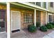 Inviting townhouse entrance features a secure screen door, set against a classic brick facade at 4842 E Kachina Trl # 3, Phoenix, AZ 85044