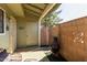 View of a well-kept patio with a privacy wall and comfortable seating area at 4842 E Kachina Trl # 3, Phoenix, AZ 85044