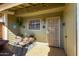 Cozy outdoor patio area with seating, string lights, and privacy wall at 4842 E Kachina Trl # 3, Phoenix, AZ 85044