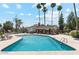 View of the refreshing community pool and amenities with blue skies overhead at 4842 E Kachina Trl # 3, Phoenix, AZ 85044