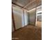 Interior view of a stall featuring partial walls, metal framing, and a trough, offering a functional space at 5226 W Tierra Buena Ln, Glendale, AZ 85306