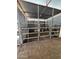 Image displaying metal framed horse stall interior with connected gating and dirt floor at 5226 W Tierra Buena Ln, Glendale, AZ 85306