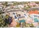 Aerial view of the property, the home features solar panels, a private pool, and desert landscaping at 5345 E Mercer Ln, Scottsdale, AZ 85254